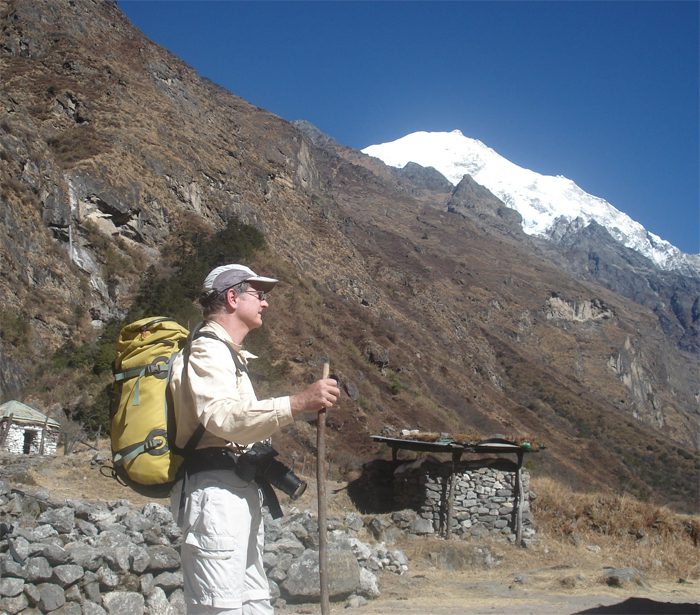 Langtang Valley Trek 2 Langtang Valley Trek route with scenic mountain views and Buddhist prayer flags in Nepal."